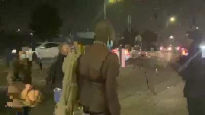 A couple defending their baby wielding nunchucks and a hatchet